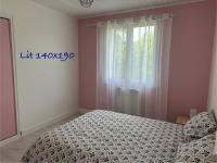 Posteľ alebo postele v izbe v ubytovaní Villa Family Surf sur un terrain arborée et clos, calme et repos