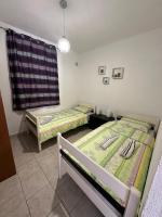 Postel nebo postele na pokoji v ubytování Apartment Island of love