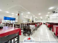 En restaurant eller et andet spisested på Hotel Estação de Minas