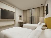 Hilton Garden Inn Brussels Airportにあるベッド