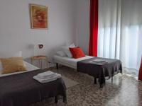 Posteľ alebo postele v izbe v ubytovaní Allo Apartments Plaza Arenal Centro 2 Habitaciones