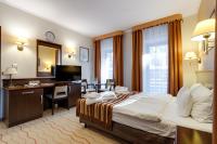 Posteľ alebo postele v izbe v ubytovaní Malinowy Dwór Hotel Medical SPA