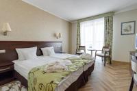 Posteľ alebo postele v izbe v ubytovaní Malinowy Dwór Hotel Medical SPA