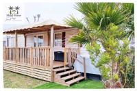 Vonkajšia záhrada v ubytovaní Mobil-home aux Sables du Midi chez Catherine et Bernard.