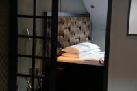 Łóżko lub łóżka w pokoju w obiekcie Hotel Vienna beim Prater