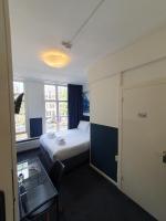 Ein Bett oder Betten in einem Zimmer der Unterkunft Hotel Hoksbergen