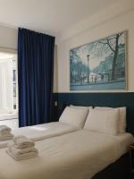 Ein Bett oder Betten in einem Zimmer der Unterkunft Hotel Hoksbergen