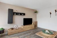 TV a/nebo společenská místnost v ubytování Ferienwohnung Blumenau
