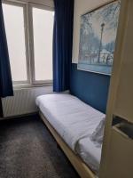 Ein Bett oder Betten in einem Zimmer der Unterkunft Hotel Hoksbergen