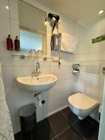 Ein Badezimmer in der Unterkunft Hotel Hoksbergen