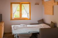 A bed or beds in a room at Piccola Valle