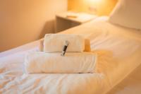 A bed or beds in a room at Piccola Valle