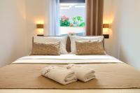 Posteľ alebo postele v izbe v ubytovaní Apartments Sinisa - Krk Town