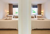 Posteľ alebo postele v izbe v ubytovaní Apartments Sinisa - Krk Town