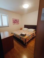 Posteľ alebo postele v izbe v ubytovaní Apartments Kraljić I