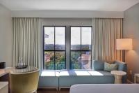 Ein Bett oder Betten in einem Zimmer der Unterkunft Hotel Effie Sandestin Resort, Autograph Collection