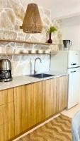Kuchyň nebo kuchyňský kout v ubytování Apartmani-Okrug Gornji-Ciovo