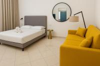 Łóżko lub łóżka w pokoju w obiekcie Garibaldi 118 Luxury Apartment