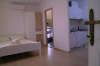 Postel nebo postele na pokoji v ubytování Studio Apartments & Rooms Lela, Sipan island