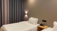7 Days Inn Fucheng Wu Gongci Gaodeng East Street Binjiang Roadにあるベッド