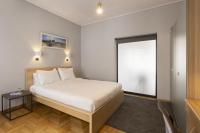 Posteľ alebo postele v izbe v ubytovaní Super modern minimal flat nr metro & arch. Museum