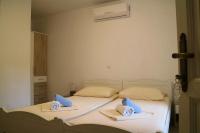 Postel nebo postele na pokoji v ubytování Studio Apartments & Rooms Lela, Sipan island