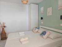 Postel nebo postele na pokoji v ubytování Apartments Maskovic Karbuni