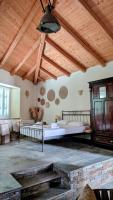 Posteľ alebo postele v izbe v ubytovaní House Moschα
