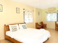 Postel nebo postele na pokoji v ubytování The Golden View Resort สวนผึ้ง