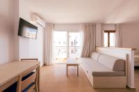 Televízia a/alebo spoločenská miestnosť v ubytovaní Bossa Bay - MC Apartments Ibiza