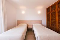Posteľ alebo postele v izbe v ubytovaní Bossa Bay - MC Apartments Ibiza
