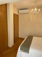 Postel nebo postele na pokoji v ubytování Apartamento Ons Sanxenxo
