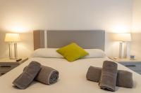 A bed or beds in a room at Studio Torresol