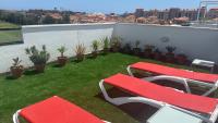Balkón alebo terasa v ubytovaní Sunny Luxury Apartment with two great sunny - level terraces, two swimming pools, in a new complex Pueblo Majorero, close to Fuerteventura Golf Club, next to the beach , Atlantico Shopping Mall and casino in Caleta de Fuste