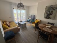 Posedenie v ubytovaní Sunny Luxury Apartment with two great sunny - level terraces, two swimming pools, in a new complex Pueblo Majorero, close to Fuerteventura Golf Club, next to the beach , Atlantico Shopping Mall and casino in Caleta de Fuste