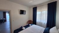 Posteľ alebo postele v izbe v ubytovaní Apartmani Marini