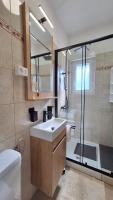 Kúpeľňa v ubytovaní Apartmani Marini