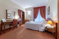 Posteľ alebo postele v izbe v ubytovaní Massimo Plaza Hotel