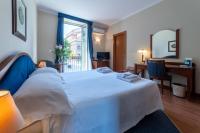 Posteľ alebo postele v izbe v ubytovaní Massimo Plaza Hotel