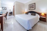 Posteľ alebo postele v izbe v ubytovaní Massimo Plaza Hotel