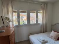 Posteľ alebo postele v izbe v ubytovaní Livemalaga Terrace & Beach Grand House