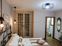 A bed or beds in a room at CASA RURAL EL TRASTERO DE CARMELO