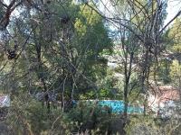 Bazén v ubytování Buena vista y privacidad, villa forestal tranquila y fresca con super piscina 80M2, a 22 minutos de Valencia nebo v jeho okolí