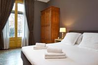 Postel nebo postele na pokoji v ubytování Fewdays Barcelona Apartments