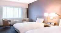 Imazu Sun Bridge Hotelにあるベッド