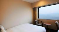 Imazu Sun Bridge Hotelにあるベッド