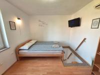 Postel nebo postele na pokoji v ubytování Apartment Carolina