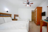 Postel nebo postele na pokoji v ubytování Datca Kilic Hotel