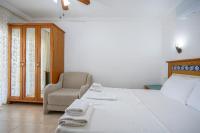 Postel nebo postele na pokoji v ubytování Datca Kilic Hotel