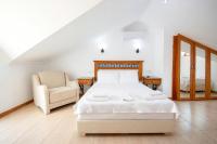 Postel nebo postele na pokoji v ubytování Datca Kilic Hotel